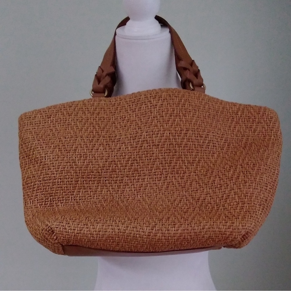 Fossil straw and leather crossbody satchel.